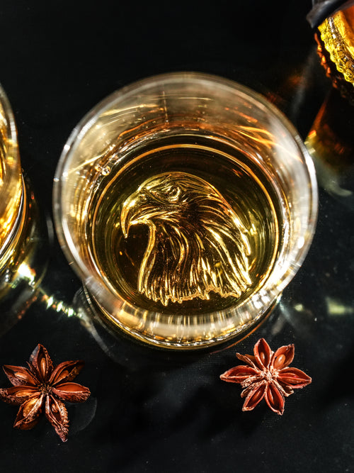 EAGLE EMBOSSED CRYSTAL WHISKEY GLASS
